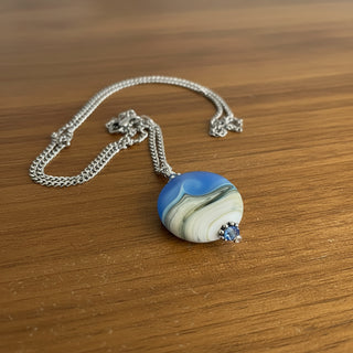 Garry White (Glass in Motion) - Necklace - Lampwork pendant - Round - matte blue and cream - Garry White - Glass in Motion - Jewellery - McMillan Arts Centre & MAC Box Office