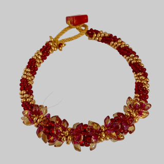 Diana Lockwood - Bracelet - Kimihimo - Red and Gold- cord fastener -  - Jewellery - McMillan Arts Centre & MAC Box Office