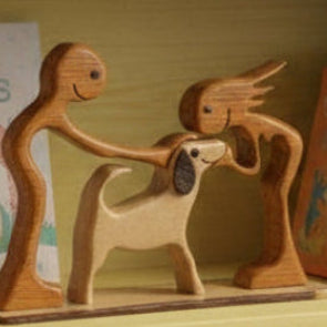 Ron Acton - Wood - Dog with children -  - Wood Art - McMillan Arts Centre & MAC Box Office
