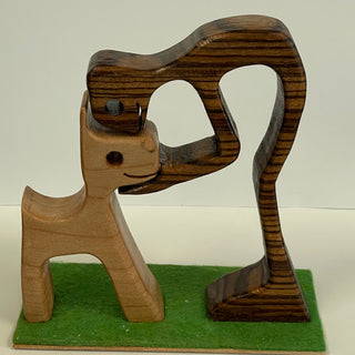 Ron Acton - Wood - Boy kissing head of dog -  - Wood Art - McMillan Arts Centre & MAC Box Office