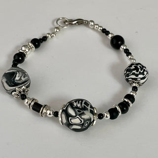 Lynn Orriss - Bracelet - Black Swirl balls