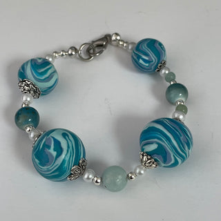 Lynn Orriss - Bracelet - Turquoise Swirl balls